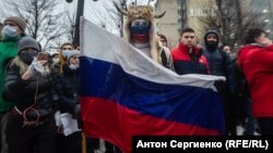 Участник акции протеста 23 января в Москве